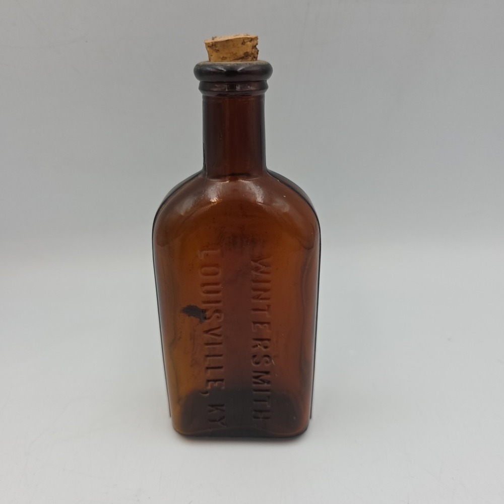 Vintage Wintersmith Louisville, Ky Amber Embossed Medicine Bottle